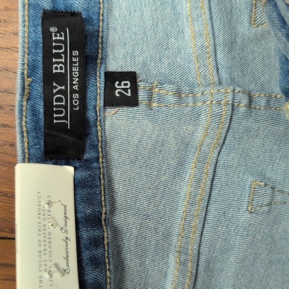 Judy Blue -  Mid Rise Denim Cut Off Shorts With Eyelet Detail - Picture 3 of 6